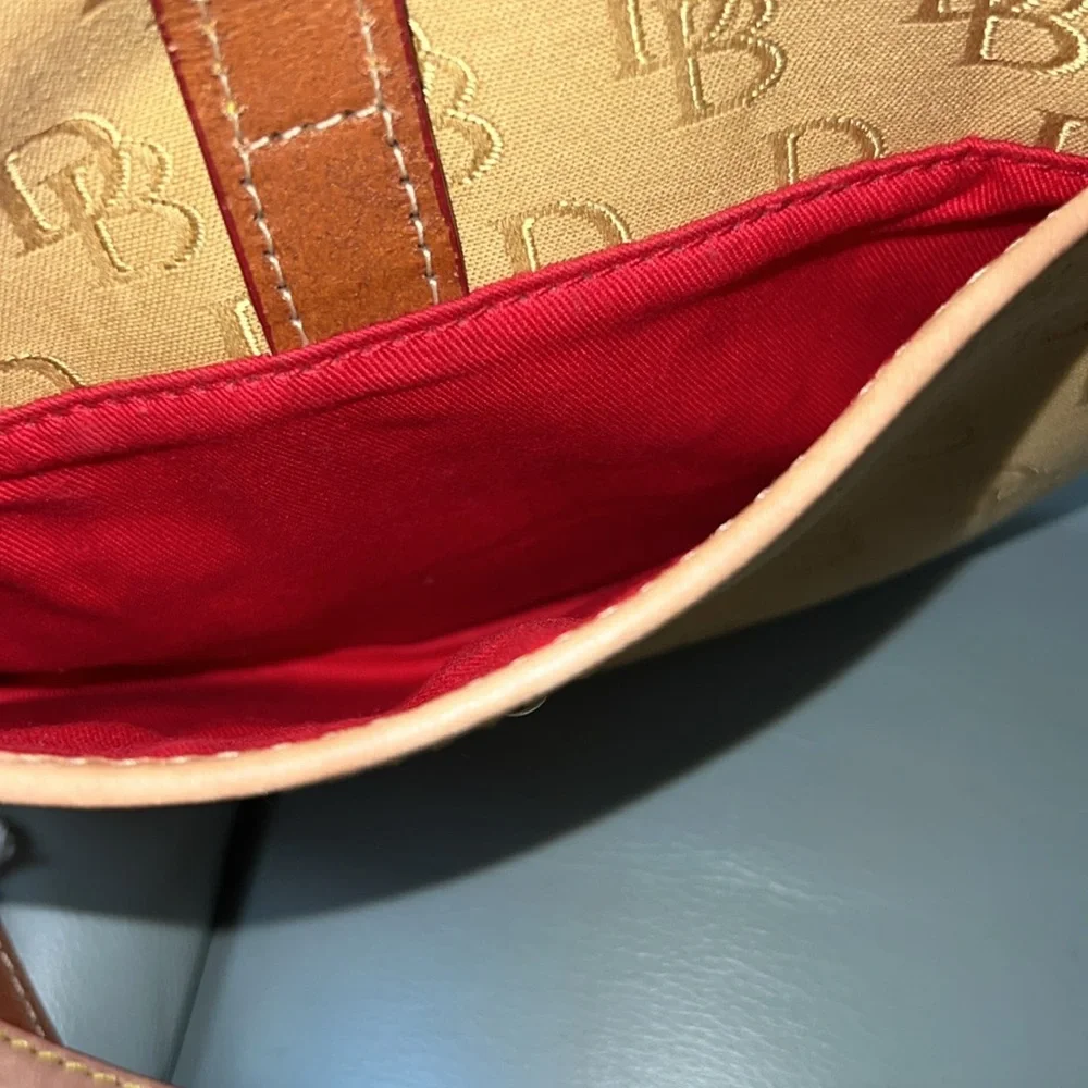Dooney & Bourke Tan canvas DB signature Crossbody Bag with Leather Trim